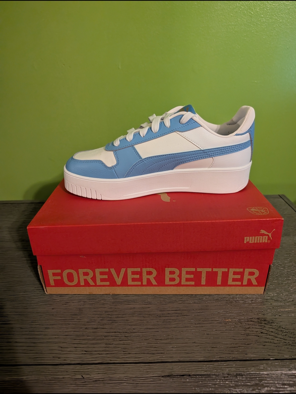 Puma Carina Sneaker in White and Light Blue